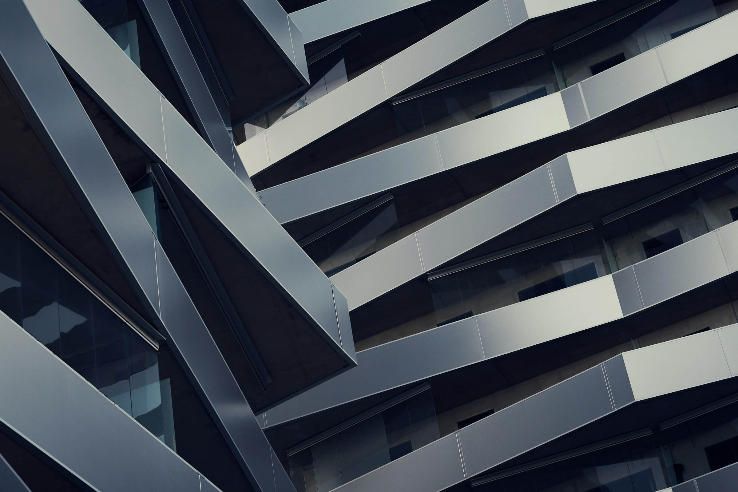a decorative background image to the main header depicting an abstract shot of a building structure