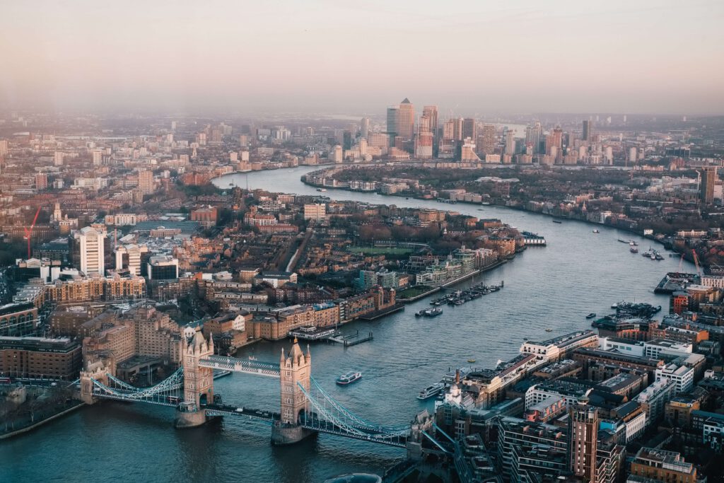 Aerial shot of London showing Tower Bridge and the Thames